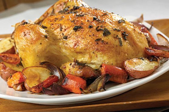 Garlic-Herb Roasted Chicken with Potatoes, Carrots, and Onions