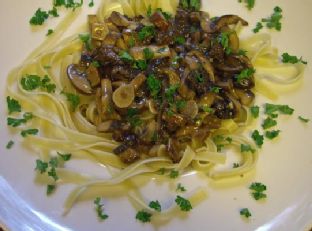 Mixed Mushroom Sauce Over Tagliatelle Pasta