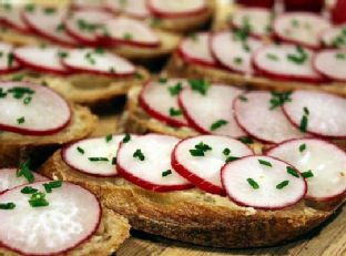 Sliced Baguette with Anchovy Chive Butter and Radishes