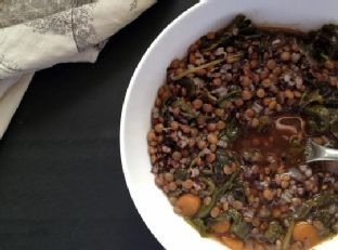 Spicy lentil and black rice soup with kale, spinach and leek