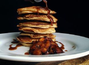 Tostone Stuffed Pancakes with a Chocolate Peanut Butter Syrup